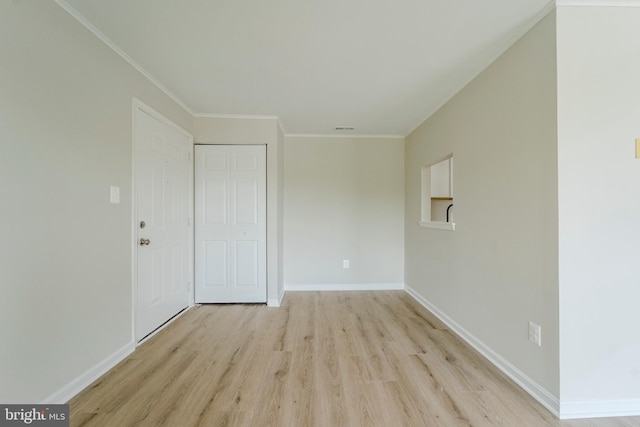 105 Water Fountain Way Unit 201, Glen Burnie, MD 21060 - spare room with light wood finished floors, baseboards, and crown molding