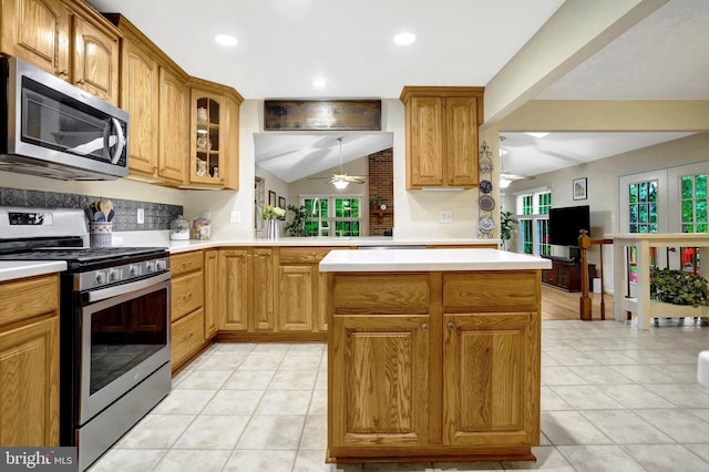 7117 Stanchion Ln, Burke, VA 22015 - kitchen featuring stainless steel appliances, a ceiling fan, healthy amount of natural light, light countertops, and recessed lighting