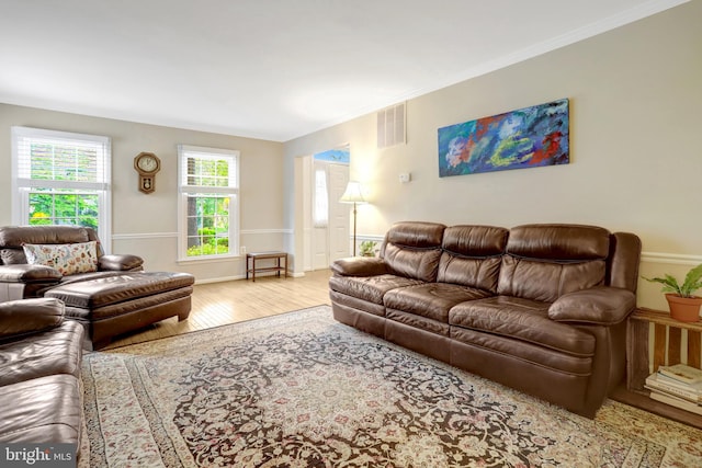 7117 Stanchion Ln, Burke, VA 22015 - living area with hardwood / wood-style floors and crown molding