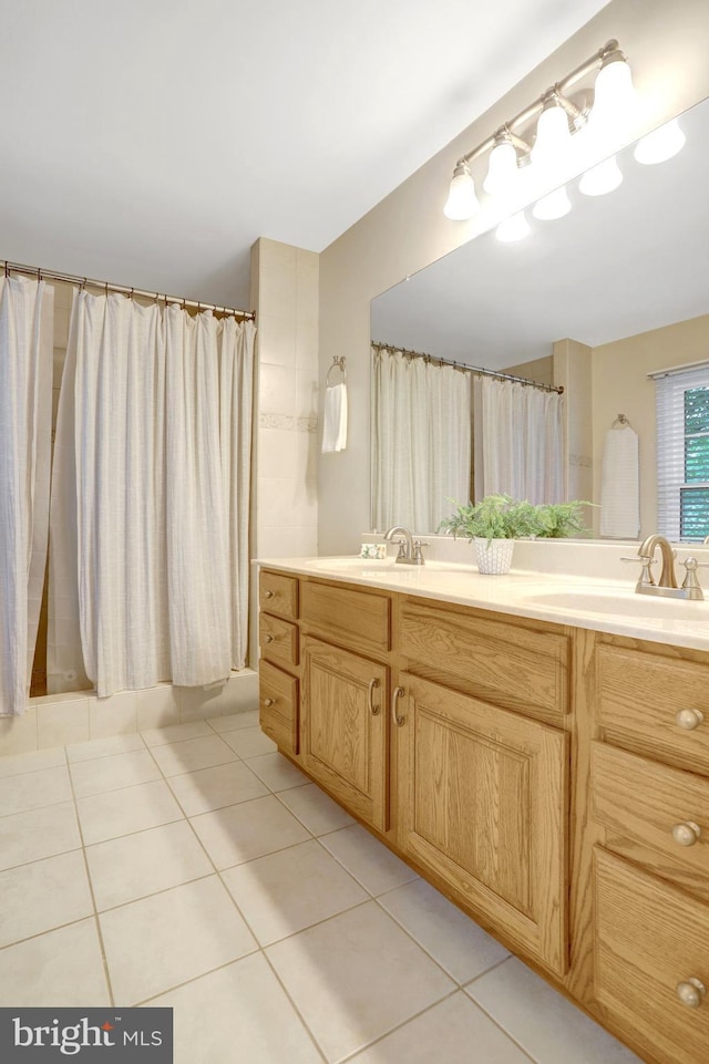 7117 Stanchion Ln, Burke, VA 22015 - full bath with tile patterned floors, double vanity, and a shower with shower curtain