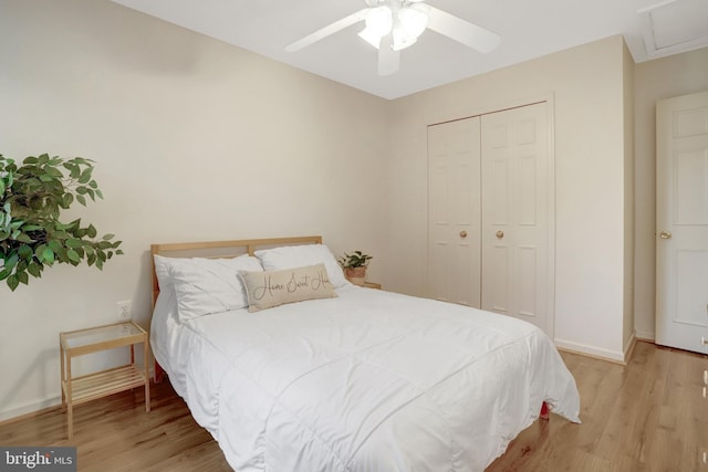 7117 Stanchion Ln, Burke, VA 22015 - bedroom featuring light wood finished floors, baseboards, a closet, and a ceiling fan