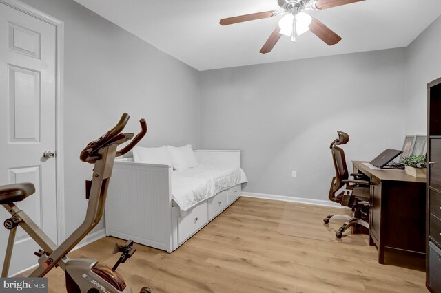 7117 Stanchion Ln, Burke, VA 22015 - bedroom featuring light wood finished floors, baseboards, a desk, and ceiling fan