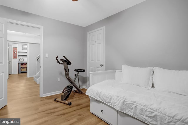 7117 Stanchion Ln, Burke, VA 22015 - bedroom featuring light wood-style floors and baseboards