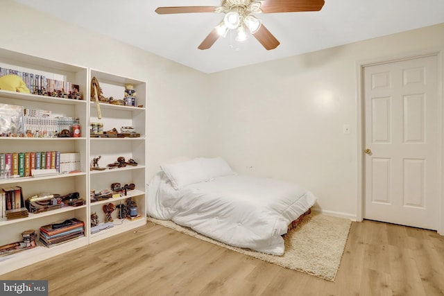 7117 Stanchion Ln, Burke, VA 22015 - bedroom featuring wood finished floors, ceiling fan, and baseboards