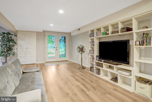 7117 Stanchion Ln, Burke, VA 22015 - living area featuring french doors, baseboards, wood finished floors, recessed lighting, and built in features