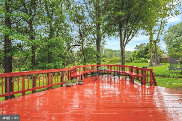 7117 Stanchion Ln, Burke, VA 22015 - wooden terrace featuring a trampoline, a yard, and view of scattered trees