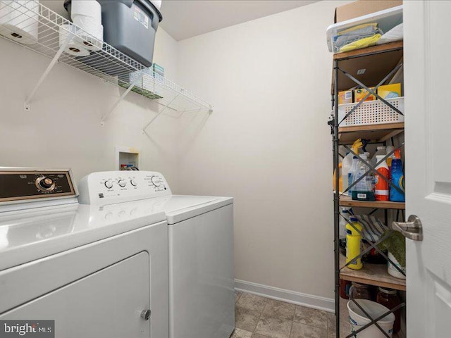 139 Gazebo Ln, Middletown, DE 19709 - laundry area with washing machine and clothes dryer, baseboards, and laundry area