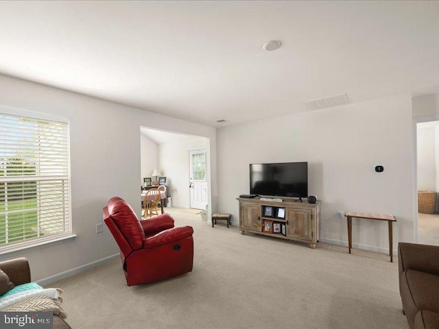 139 Gazebo Ln, Middletown, DE 19709 - living room featuring baseboards, visible vents, and carpet