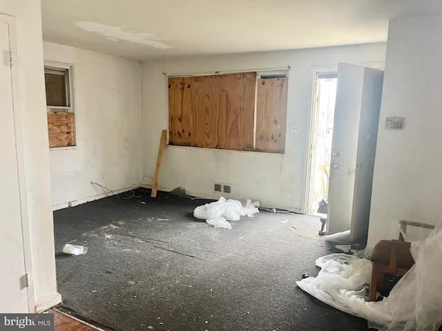 spare room featuring visible vents