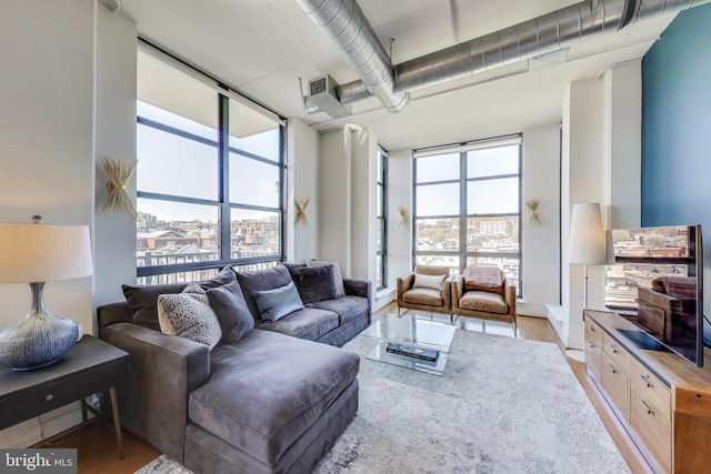 living area featuring light wood-style flooring