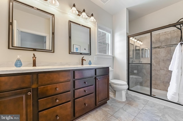 3419 Pocahontas Dr, Edgewater, MD 21037 - bathroom with a shower stall, toilet, double vanity, and a sink