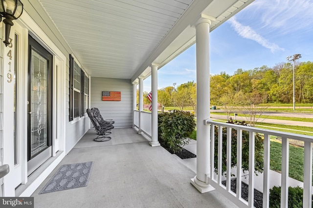 3419 Pocahontas Dr, Edgewater, MD 21037 - balcony featuring covered porch