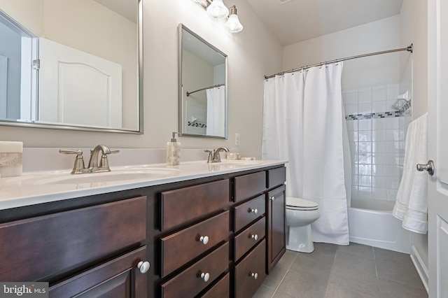 3419 Pocahontas Dr, Edgewater, MD 21037 - bathroom with toilet, tile patterned floors, a sink, and double vanity