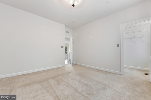 3419 Pocahontas Dr, Edgewater, MD 21037 - empty room featuring baseboards, visible vents, and light colored carpet