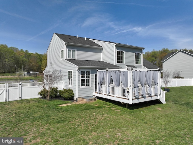 3419 Pocahontas Dr, Edgewater, MD 21037 - rear view of property with a gate, a yard, a deck, and a fenced backyard