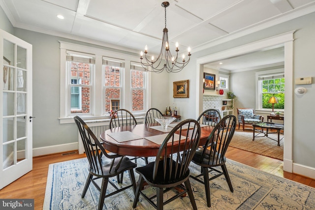 3213 Jocelyn St NW, Washington, DC 20015 - dining area with crown molding, a chandelier, light wood-style flooring, recessed lighting, and coffered ceiling