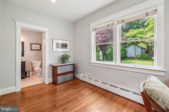 3213 Jocelyn St NW, Washington, DC 20015 - sitting room with baseboard heating, healthy amount of natural light, light wood-type flooring, and recessed lighting