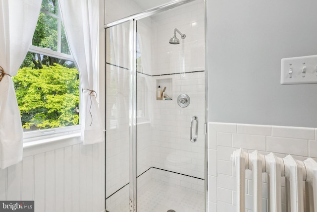 3213 Jocelyn St NW, Washington, DC 20015 - bathroom featuring a stall shower, radiator heating unit, and healthy amount of natural light