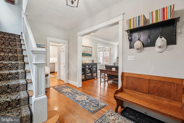 3213 Jocelyn St NW, Washington, DC 20015 - entrance foyer featuring stairs, ornamental molding, and wood finished floors