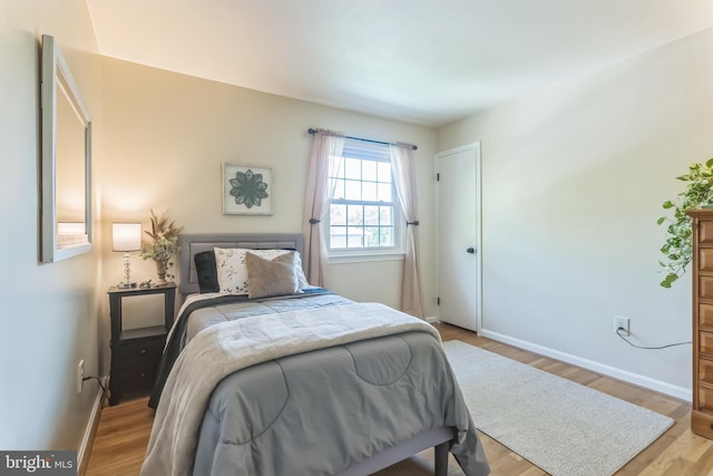 705 Hope Ln, Gaithersburg, MD 20878 - bedroom featuring baseboards and light wood-style floors