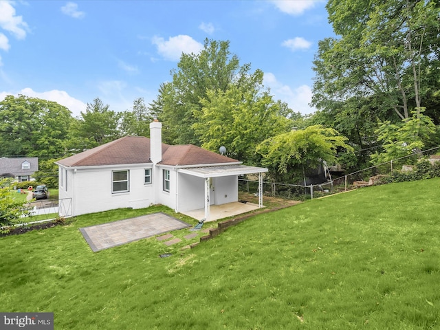 402 Elm Ave, Takoma Park, MD 20912 - back of property featuring a patio, a chimney, and a shingled roof