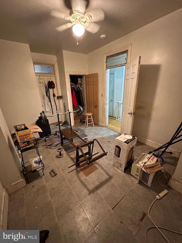 bedroom featuring a ceiling fan and a closet