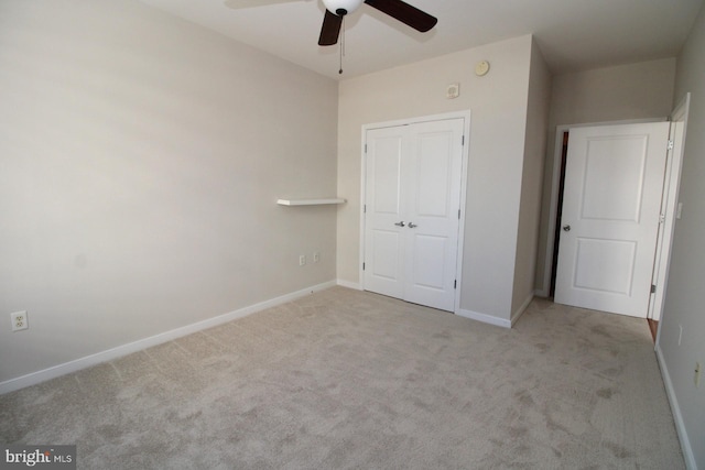6506 America Blvd Unit 302, Hyattsville, MD 20782 - unfurnished bedroom with baseboards, carpet floors, and a closet