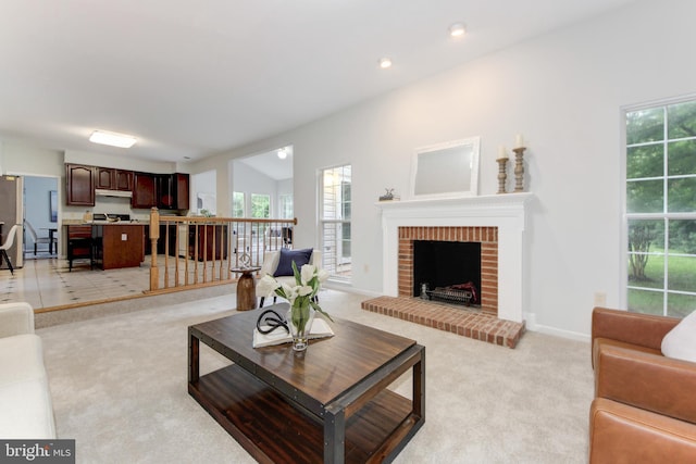 13434 Fairland Park Dr, Silver Spring, MD 20904 - living area with light colored carpet, a fireplace, baseboards, and recessed lighting
