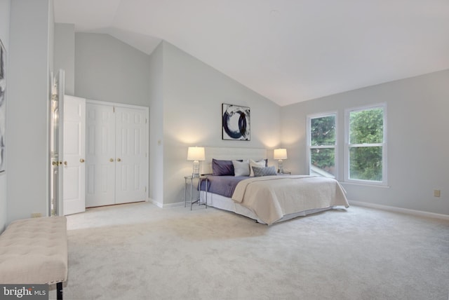 13434 Fairland Park Dr, Silver Spring, MD 20904 - carpeted bedroom with lofted ceiling, baseboards, and a closet