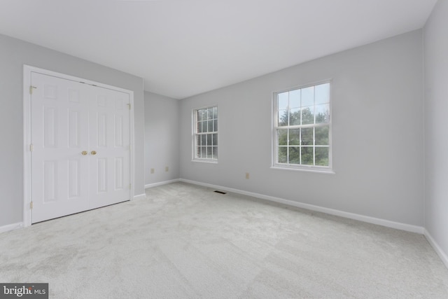 13434 Fairland Park Dr, Silver Spring, MD 20904 - unfurnished bedroom featuring carpet flooring, baseboards, and a closet