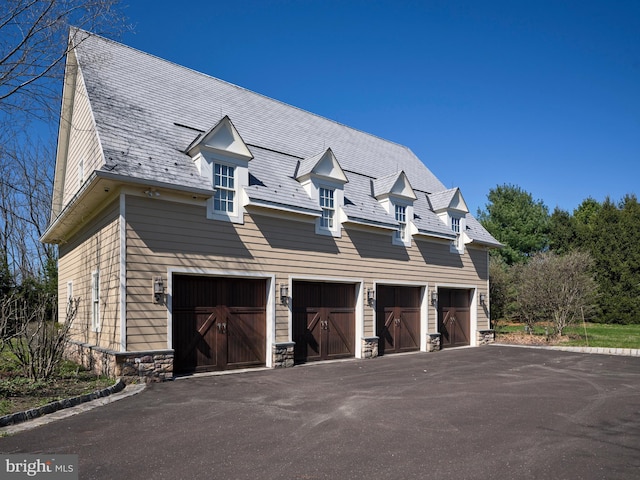 2727 Aquetong Rd, New Hope, PA 18938 - view of home's exterior featuring driveway, a garage, and stone siding