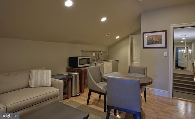 2727 Aquetong Rd, New Hope, PA 18938 - dining room with recessed lighting, a chandelier, light wood-style floors, stairway, and lofted ceiling