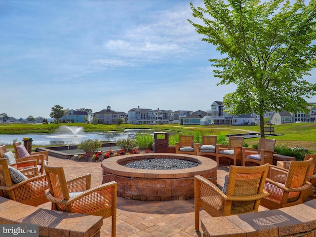 32953 Shadeland Ave, Millsboro, DE 19966 - view of patio / terrace featuring a water view, an outdoor fire pit, and a residential view