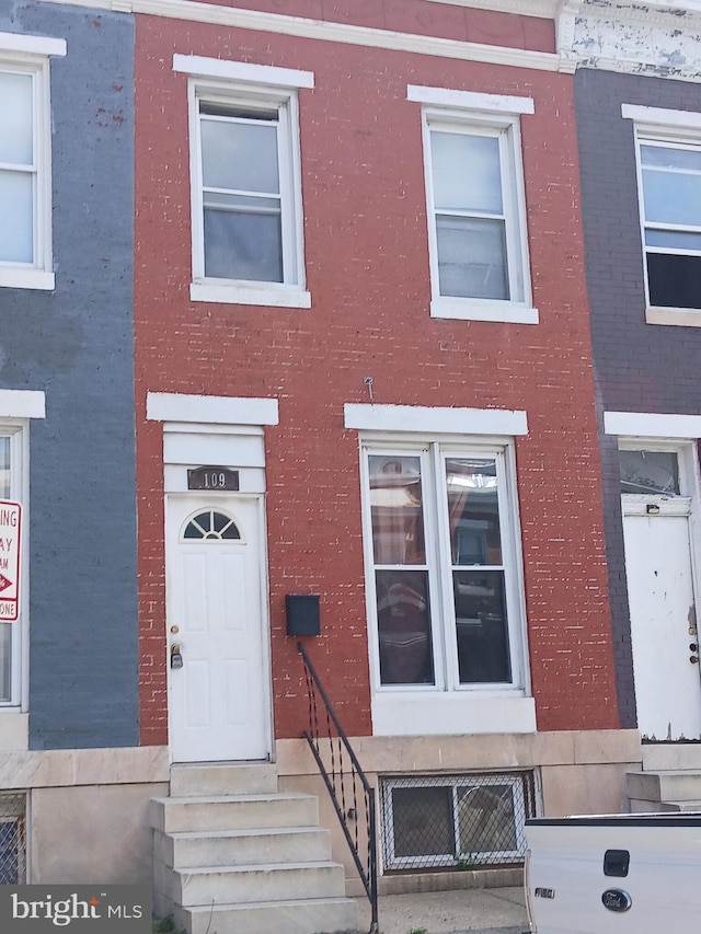 109 N Payson St N, Baltimore, MD 21223 - multi unit property with brick siding and entry steps
