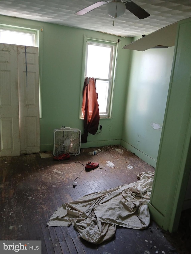 109 N Payson St N, Baltimore, MD 21223 - unfurnished room featuring wood-type flooring and a ceiling fan