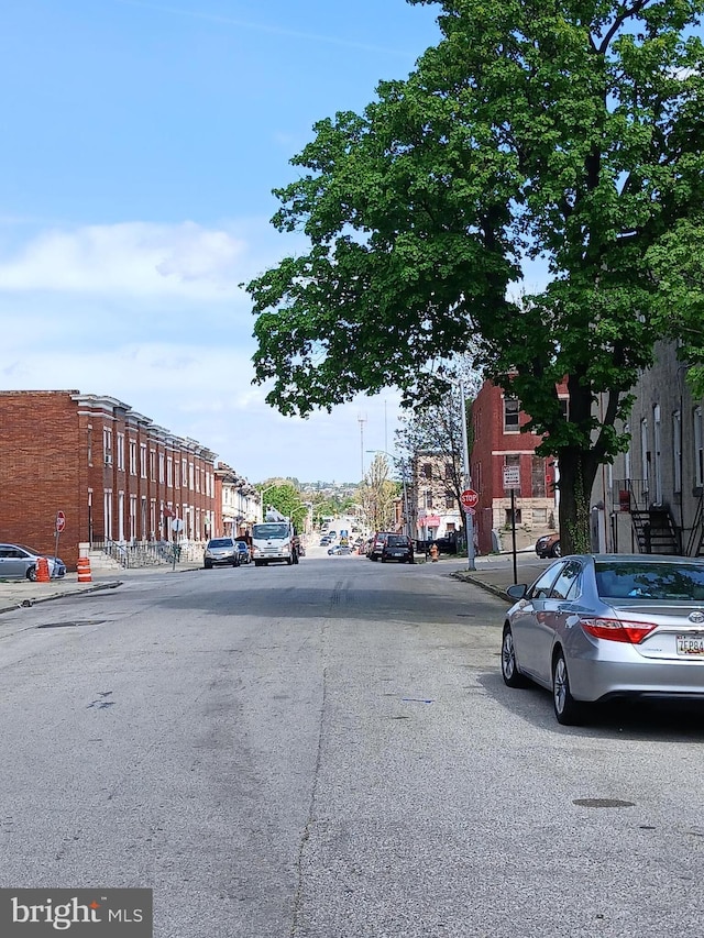 109 N Payson St N, Baltimore, MD 21223 - view of road featuring sidewalks, traffic signs, and curbs
