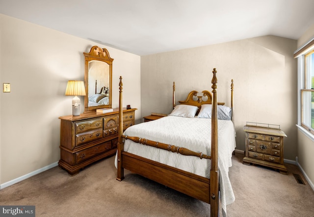 bedroom featuring visible vents, carpet, and baseboards