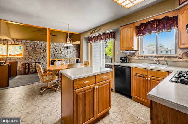 kitchen with a sink, light countertops, a center island, and black dishwasher