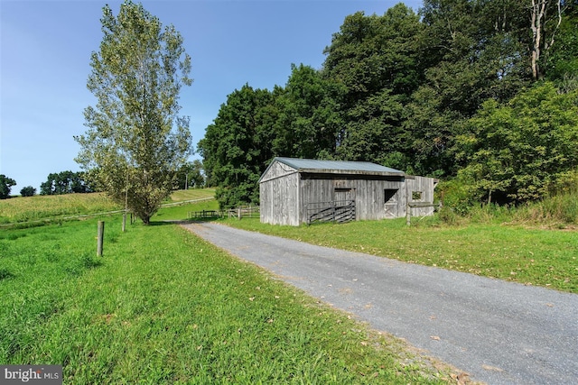 view of street with an outbuilding