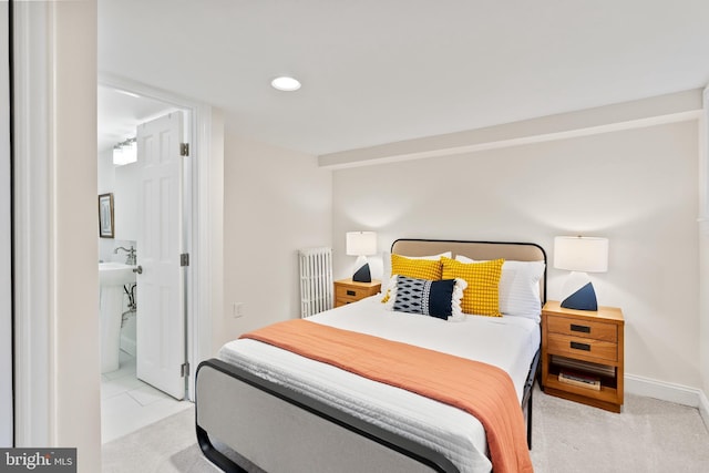 119 Seaton Pl NW, Washington, DC 20001 - bedroom with radiator, baseboards, ensuite bathroom, and recessed lighting
