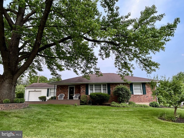 113 Edgeroad Ln, Wilmington, DE 19803 - single story home featuring brick siding, driveway, a front lawn, and an attached garage
