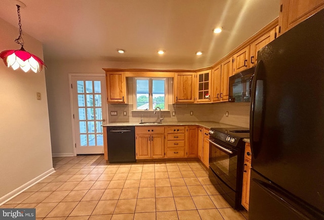 113 Edgeroad Ln, Wilmington, DE 19803 - kitchen with black appliances, tasteful backsplash, a sink, baseboards, and light tile patterned floors