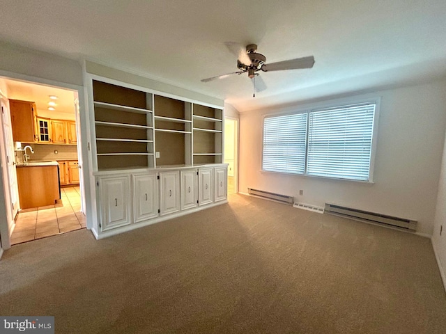 113 Edgeroad Ln, Wilmington, DE 19803 - unfurnished room with baseboard heating, ceiling fan, light carpet, and a sink