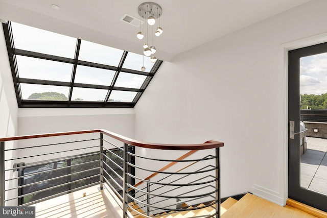 staircase with visible vents
