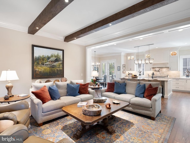 living room with an inviting chandelier, recessed lighting, dark wood-style floors, and beam ceiling