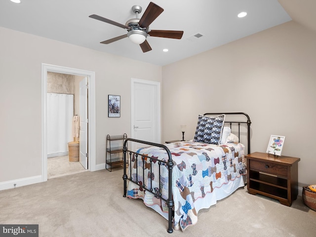 carpeted bedroom featuring ensuite bath, recessed lighting, baseboards, a ceiling fan, and visible vents