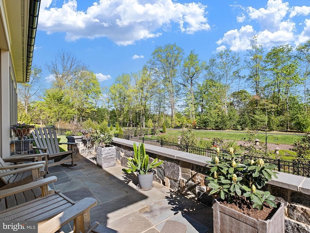 view of patio / terrace with fence