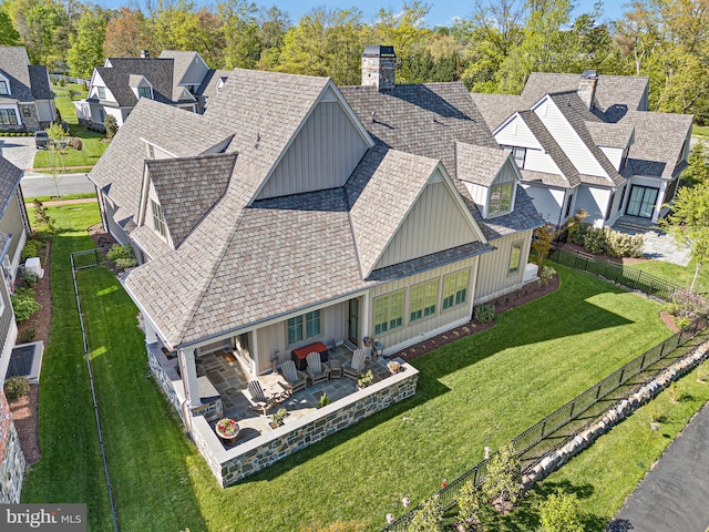 drone / aerial view with a residential view