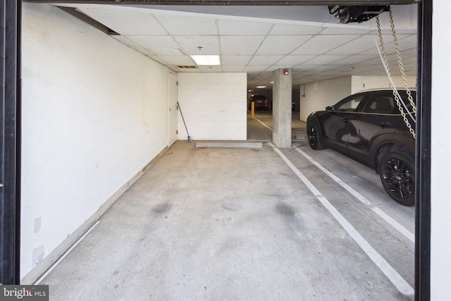 820 Belmont Bay Dr Unit 405, Woodbridge, VA 22191 - parking garage with baseboards