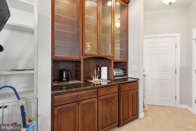 820 Belmont Bay Dr Unit 405, Woodbridge, VA 22191 - bar featuring baseboards, a sink, and light colored carpet